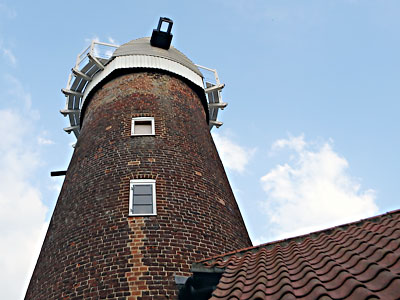 Cap and windshaft in place on mill towe